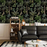 Black leather sofa and record shelf against jungle foliage wallpaper over white panelling