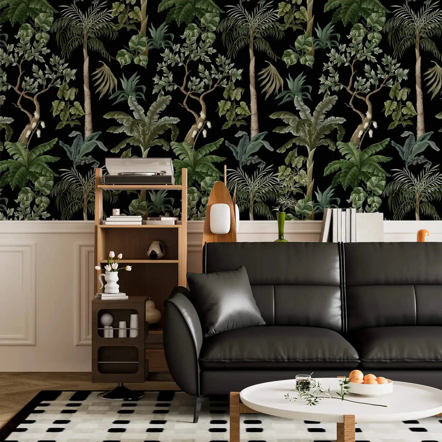 Black leather sofa and record shelf against jungle foliage wallpaper over white panelling
