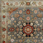 This Blissful Bouquet Hand Knotted Area Rug showcases intricate Persian motifs with vibrant floral patterns in rich reds and earthy tones, perfect for adding a touch of elegance to your living room. Crafted from high-quality wool, this 8x10 wool rug is an ideal choice for those seeking luxurious area rugs for living room spaces.