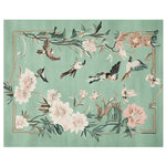 This exquisite area rug features a hand-tufted design with a serene teal background, adorned with delicate floral motifs and fluttering birds. Perfectly sized for living rooms, this 8x10 wool rug brings a touch of nature indoors, creating a tranquil and inviting atmosphere.