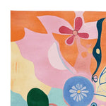 A vibrant, contemporary area rug with an abstract design featuring colorful floral and geometric shapes. Perfect for adding a splash of color to your living room, this hand tufted wool rug combines modern artistry with comfort, making it an ideal choice for area rugs in the living room.