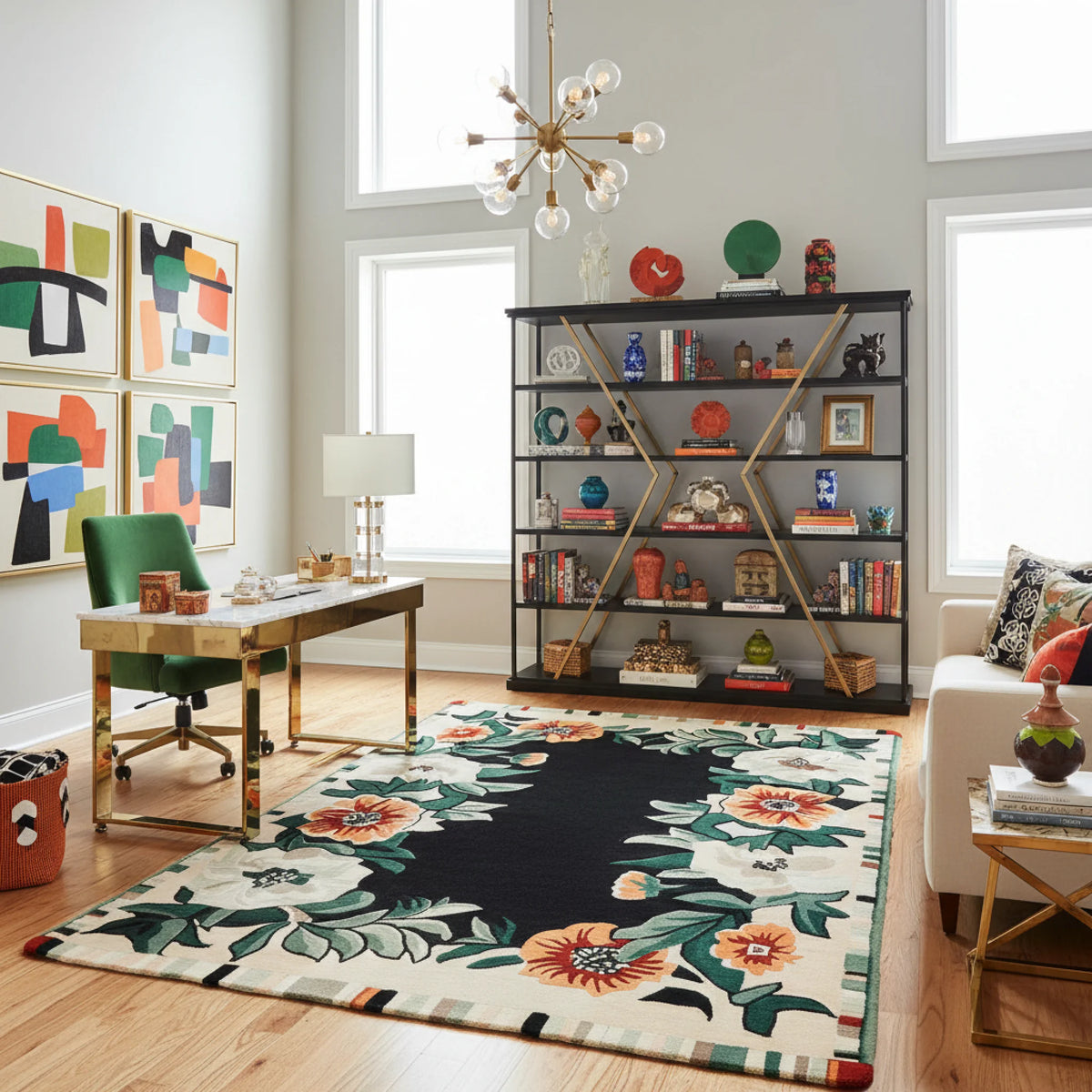 Modern office room with a floral rug, bookshelf, and artwork.