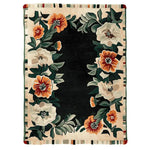 This beautiful Bloom Border Hand Tufted Rug showcases a vibrant floral design, perfect for enhancing living room decor. The area rug features lush blooms in earthy tones set against a dark background, making it an ideal wool rug choice for those seeking elegant floral rugs to complement their living space.