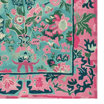 Vibrant hand-tufted wool area rug featuring an abstract floral design in pink, green, and blue hues. Perfect as a square area rug for large living rooms, adding a touch of elegance and color. Ideal for those seeking unique living room area rugs.