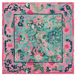 Vibrant Bloom in Harmony Hand Tufted Area Rug featuring a colorful floral design. This square wool rug is perfect for adding a splash of color to large living room spaces, showcasing intricate botanical patterns in shades of pink, teal, and navy.