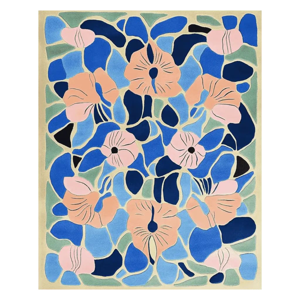 Vibrant area rug showcasing a garden-themed mosaic design with blue and peach floral patterns, perfect for adding a touch of nature to your home decor.