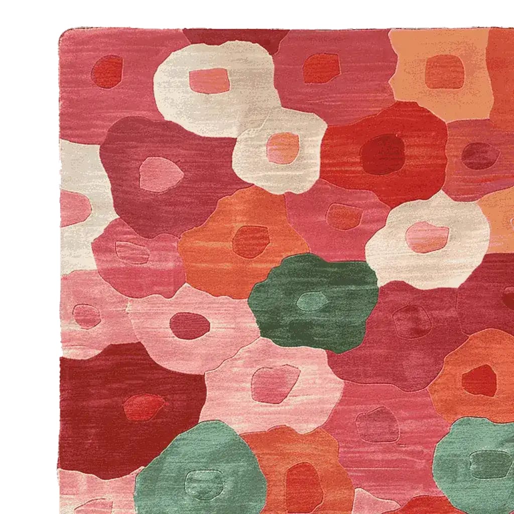 A vibrant Bloom Pop Garden hand-tufted area rug showcasing an abstract floral design with a mix of red, pink, green, and orange hues. Ideal for contemporary interiors, this wool rug adds a lively touch to any living room setting. Perfect size for living room rugs 8x10, enhancing your space with a modern flair.