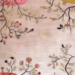 This beautiful area rug features an intricate floral design with delicate branches and blossoms in soft, earthy tones. Perfect for enhancing large living rooms, this hand-tufted wool rug adds a touch of elegance and warmth to any space. Ideal for those seeking a stylish floral rug for their living room area.