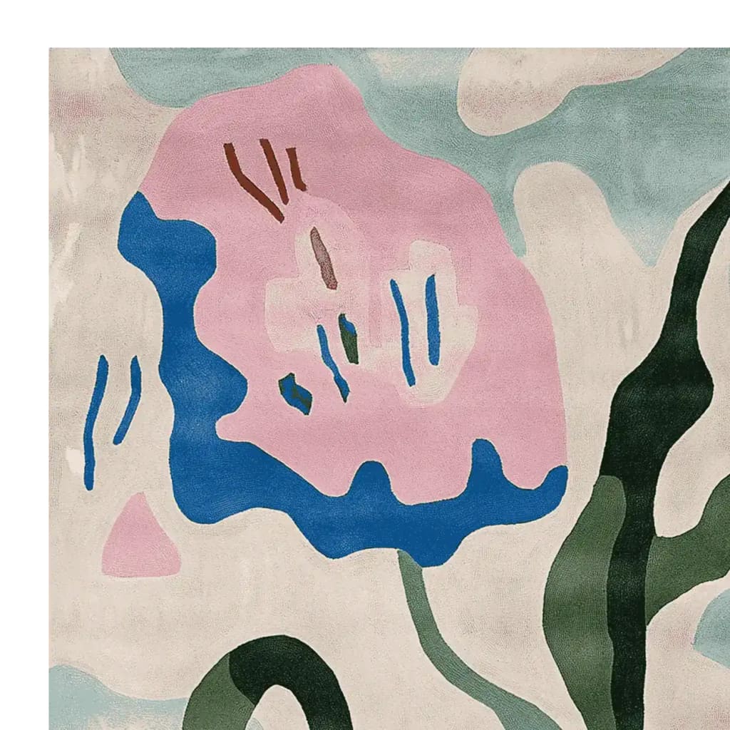 Close-up of the Blooming Shape Symphony Hand Tufted Rug showcasing an abstract floral design in pink, blue, and green hues. This contemporary wool area rug is perfect for adding a vibrant touch to any living room. Ideal for those seeking an 8x10 living room area rug.