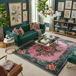 Living room with green sofa, floral rug, and decorative items.
