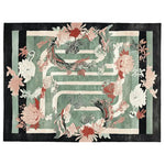 A stunning Blossom Meadow Path hand-tufted area rug ideal for living room spaces. The rug features a beautiful floral design with a harmonious blend of green, pink, and earthy tones, making it a perfect wool rug choice for those seeking elegant and artistic rugs for living room decoration.