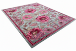 Blossom Medley Hand Tufted Rug, grey field of pink blooms with a dotted magenta border