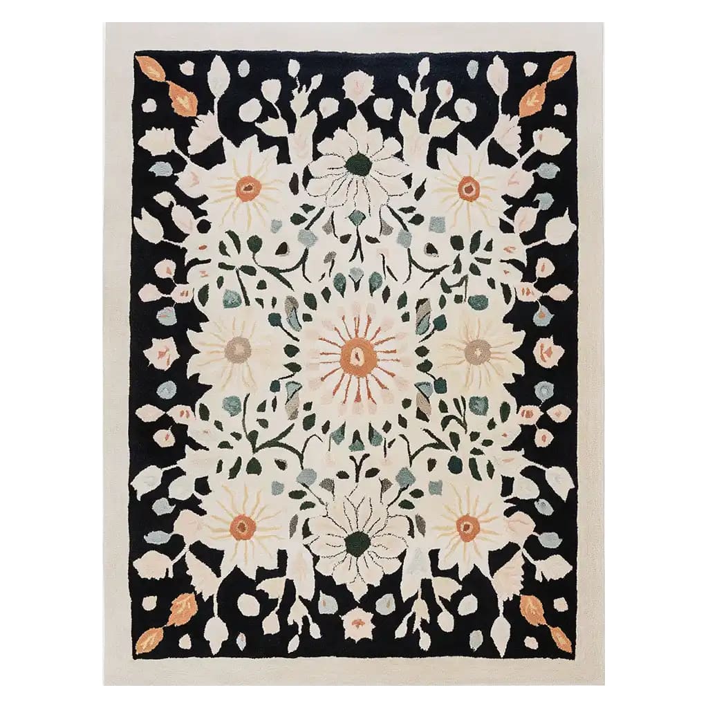 Blossom Radiance Hand Tufted Wool Area Rug featuring an intricate floral pattern in soft pastels and bold black borders, offering a sophisticated and elegant touch to any room.