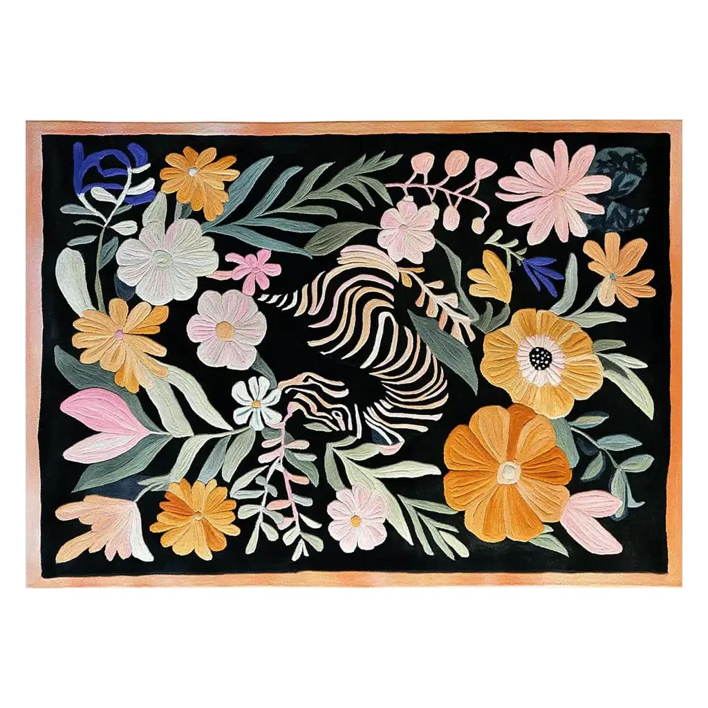Vibrant hand-tufted wool rug featuring an abstract tiger design surrounded by colorful flowers and leaves, ideal for adding a touch of nature to any room.