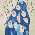 The Blossom Veil Muse Hand Tufted Area Rug features a vibrant design with abstract floral patterns in shades of blue and pink, perfect for adding a contemporary touch to large living room spaces. This wool rug combines artistic elegance with functional style, making it an ideal choice for living room area rugs.