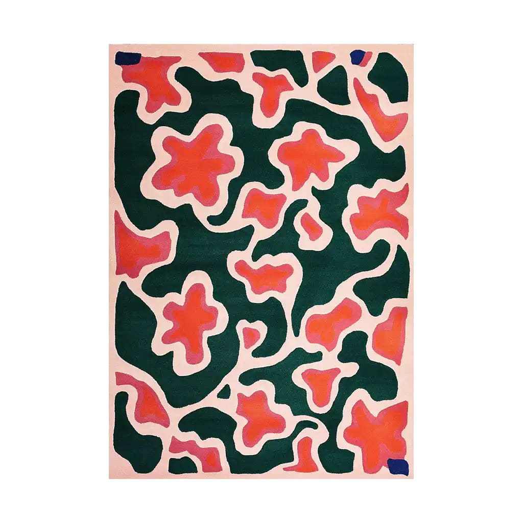 Top view of the Blossoming Garden Harmony Hand Tufted Wool Area Rug featuring an abstract floral pattern with vibrant pink and green colors on a soft cream background.