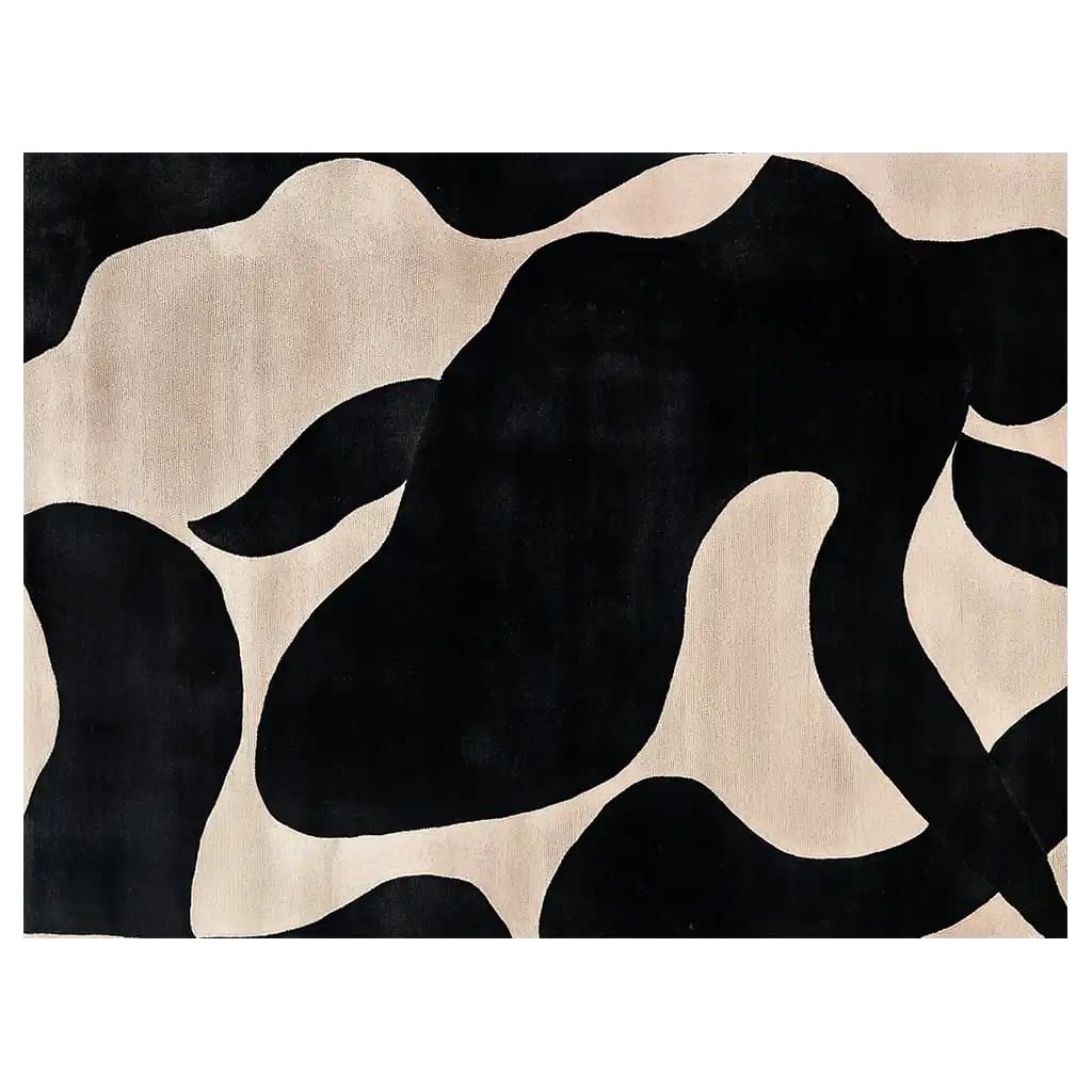 A stylish, abstract area rug featuring a bold black and beige pattern with fluid, organic shapes. The hand-tufted wool rug adds a touch of modern elegance to any room.