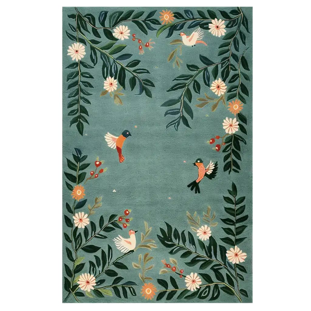 A beautifully designed area rug featuring a nature-inspired pattern with birds and flowers on a soft blue background. Intricate details of leaves and blossoms create a harmonious and inviting look, perfect for adding a touch of elegance to any room.
