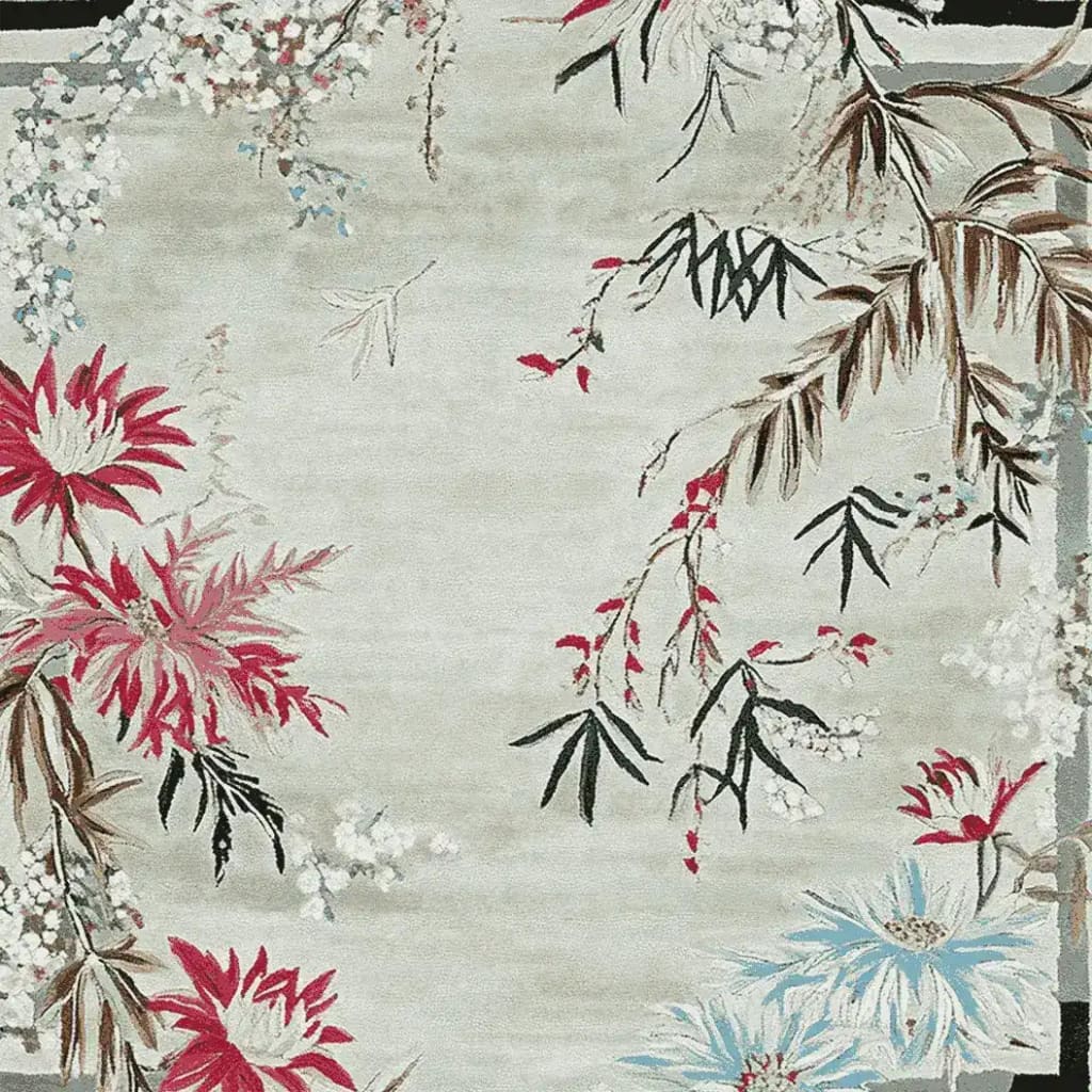 The Blossoms In Bloom Hand Tufted Area Rug showcases an elegant floral design with vibrant red and blue flowers on a neutral background. Perfect for adding a touch of sophistication to any living room, this wool rug is available in an 8x10 size, making it an ideal choice for area rugs for living rooms.