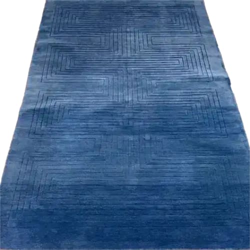 Explore the Blue Arctic Geo Modern Hand Tufted Wool Rug, an elegant 8 x 10 ft area rug perfect for enhancing your living room or dining room. This plush wool rug features a sophisticated geometric pattern, offering both comfort and style as a centerpiece for your space.