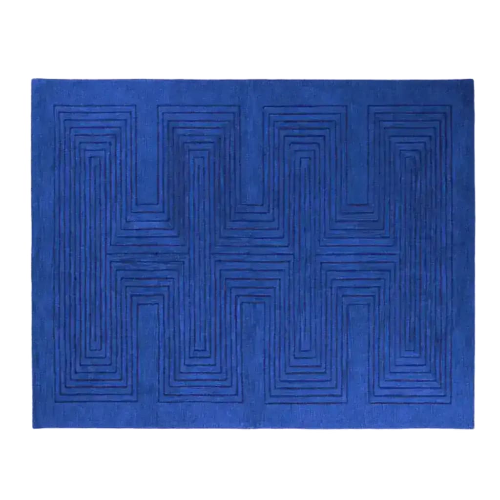A top view of the Blue Arctic Geo Modern Hand Tufted Wool Rug, measuring 8 x 10 ft. This elegant area rug features intricate geometric patterns in rich blue tones, perfect for enhancing the decor of living rooms or dining rooms. Ideal as a wool rug for both style and comfort, it's an excellent choice for dining room area rugs or as a centerpiece in your living room.