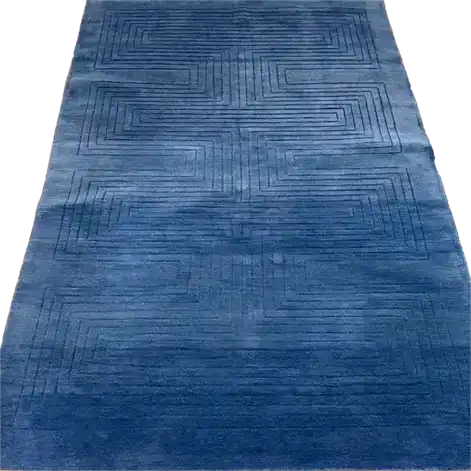 Explore the Blue Arctic Geo Modern Hand Tufted Wool Rug, an elegant 8 x 10 ft area rug perfect for enhancing your living room or dining room. This plush wool rug features a sophisticated geometric pattern, offering both comfort and style as a centerpiece for your space.