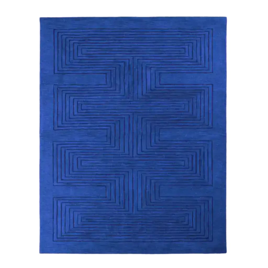 Top view of the Blue Arctic Geo Modern Hand Tufted Wool Rug, 8 x 10 ft. This striking area rug features a geometric pattern, making it a stylish addition to any living room or dining room. Perfect for those seeking quality wool rugs for their home.