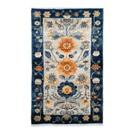 Beautiful Blue Blossom Edge Medium Hand Knotted Wool Rug, showcasing intricate Persian design with floral patterns, perfect for living room area rugs. This 8x10 wool rug features vibrant blue and orange hues, adding elegance to any living space.