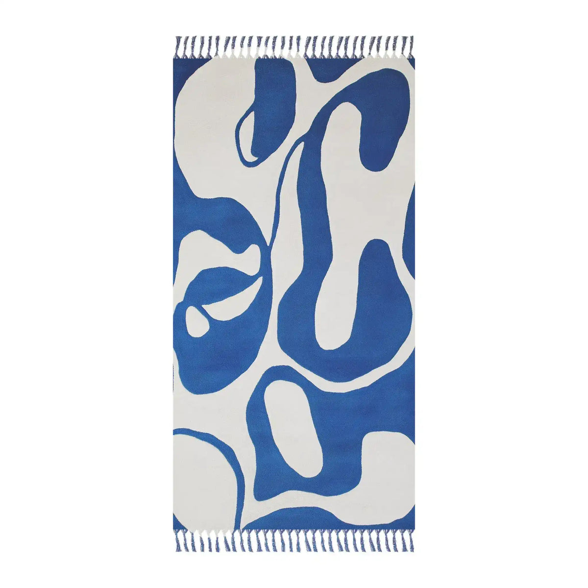 Blue and white tasseled beach towel with fluid abstract curvilinear pattern, portrait flat lay with fringe ends