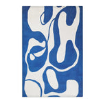 Blue abstract modern rug with flowing white organic shapes and visible stitched top edge