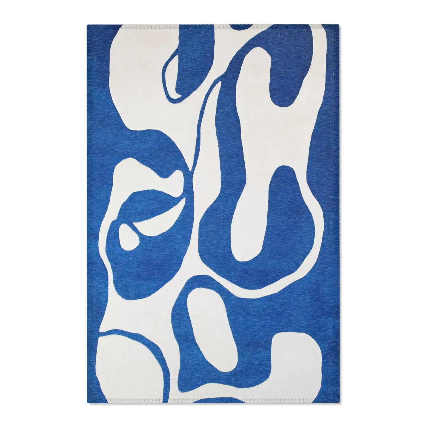 Cobalt blue and cream fluid abstract rug with large curvilinear shapes, soft pile, flat lay front