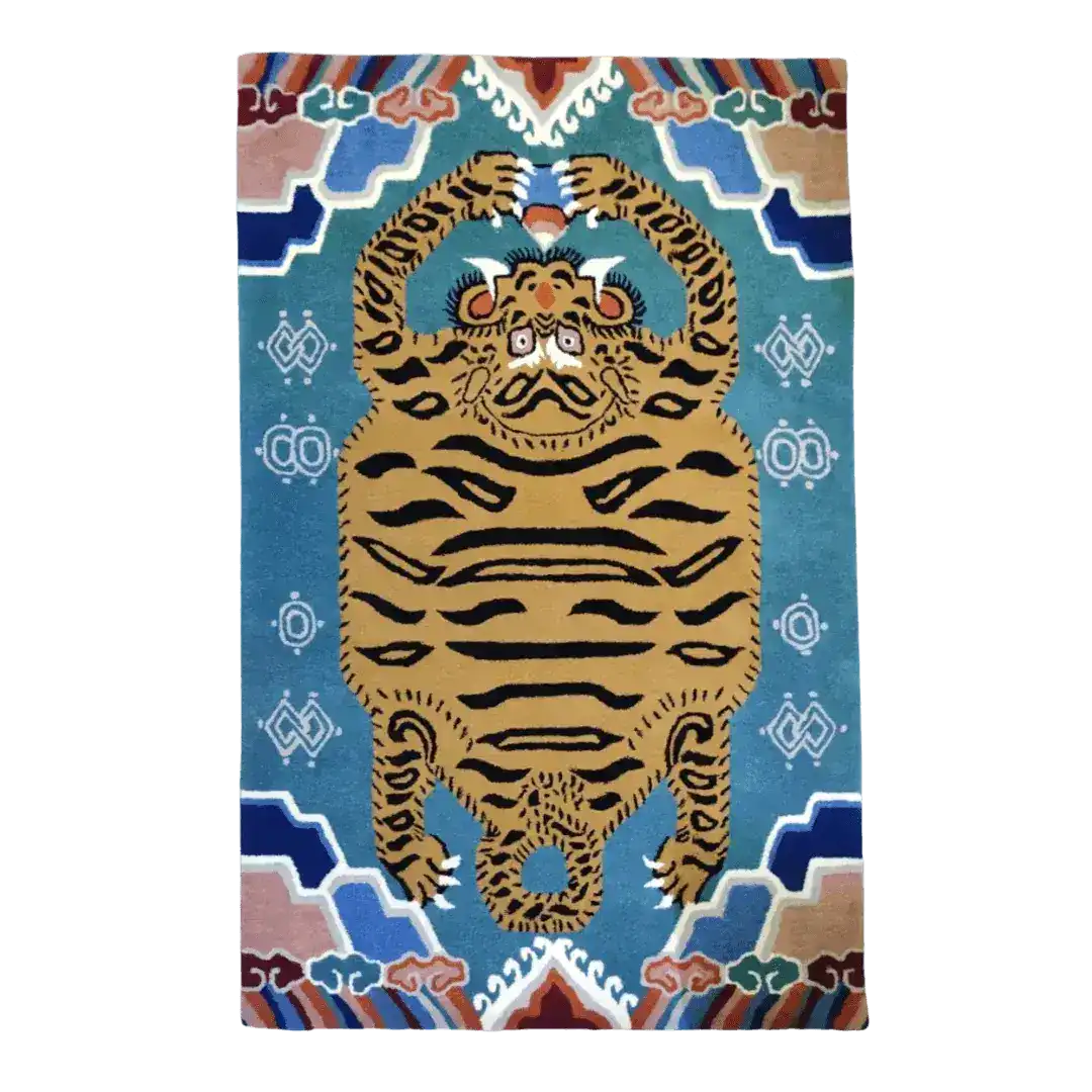 This stunning Blue Oriental Tiger Hand Tufted Wool Rug showcases an intricate tiger design with vibrant colors on a rich blue background. Perfect as a centerpiece in your bedroom or living room, this area rug adds a touch of elegance and warmth. Crafted from high-quality wool, it's ideal for those seeking bedroom area rugs or wool rugs to enhance their home decor.