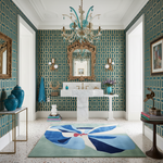 Luxurious bathroom with teal wallpaper, marble sink, and decorative rug.