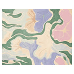 Blush Breeze Bloom Hand Tufted Rug showcasing an abstract floral design with soft pastel colors including green, pink, and purple. This contemporary area rug is perfect for large living rooms and is crafted from high-quality wool, offering both style and comfort.