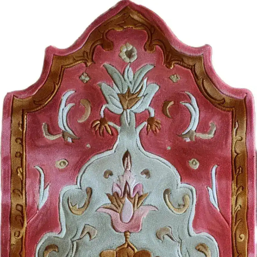 Close-up of the Blush Luxe Hand Tufted Wool Rug Runner showcasing intricate floral patterns with a blend of pink, brown, and cream colors. This elegant area rug is perfect for adding a contemporary touch to your hallway, kitchen, bedroom, office, or bathroom.