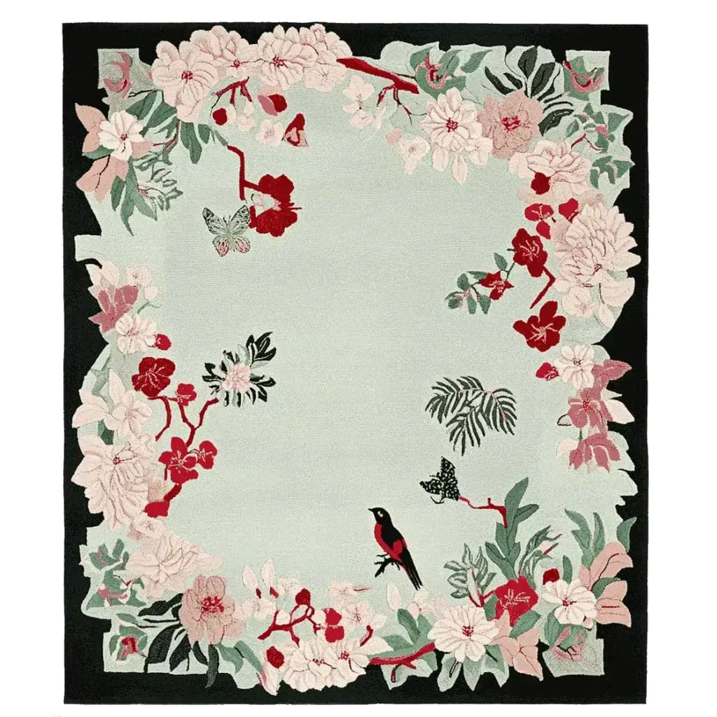 Blush Meadow Charm Hand Tufted Rug featuring a vibrant floral border with red, pink, and green hues. Ideal for large living room spaces, this wool area rug adds a touch of elegance and nature-inspired charm to your home decor.