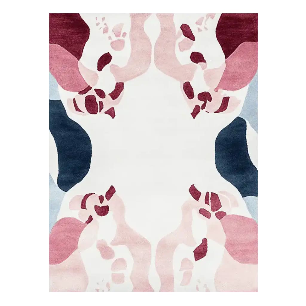 The Blush Mirage Bloom Hand Tufted Rug features an abstract design with soft pink, burgundy, and blue hues, perfect as a contemporary area rug for living rooms. Its wool construction makes it a durable choice for an 8x10 space, adding elegance and warmth to your home decor.