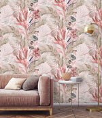 Blush sofa with gold lamps against pink tropic breeze wallpaper of soft palm fronds