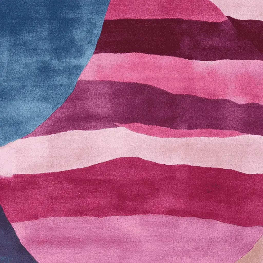 This vibrant area rug features a stunning abstract design with bold hues of pink and deep blue, perfect for contemporary living room decor. The wool rug's hand-tufted texture adds a touch of luxury, making it a standout piece among living room area rugs and an ideal choice for those seeking unique rugs for their living space.