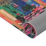Rolled corner of Bold Blue Elegance Luxe Maximalist Rug revealing grey grid backing with zigzag stitching and vibrant printed face