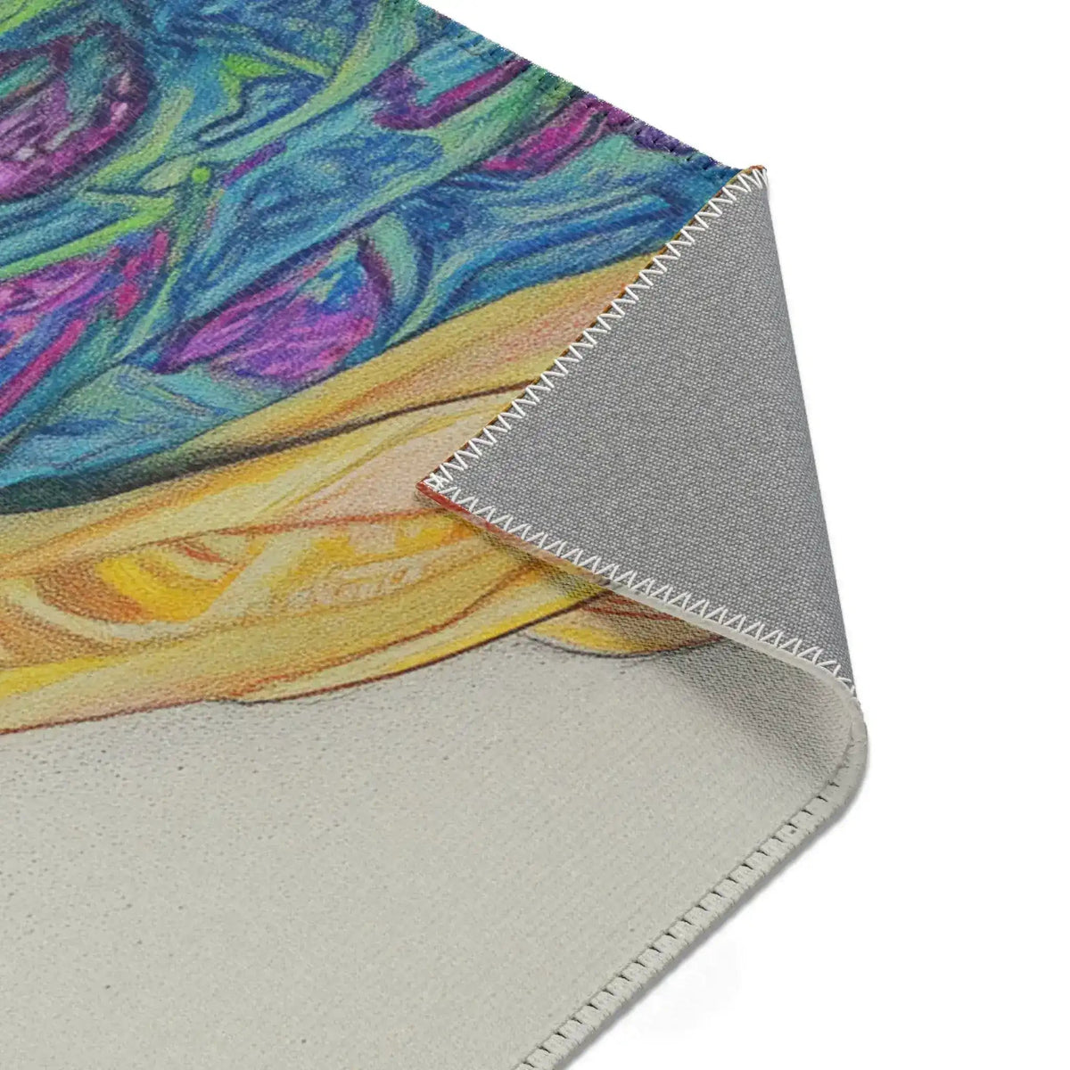 Bold Elegance Fashionista Art Accent Rug corner detail blue purple floral pattern and anti-slip gray backing
