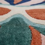 Close-up of a textured rug with geometric pattern