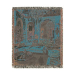 Bold Maximalist Elegance Woven Blanket reverse 2 — square teal charcoal back, arch hall scene in muted tones, fringe edges