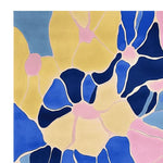 Vibrant abstract area rug featuring a bold fusion of colors in yellow, blue, and pink, creating a modern artistic design.