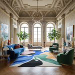 Luxurious living room with ornate ceiling,  a contemporary wool rug, large windows, and modern furniture.