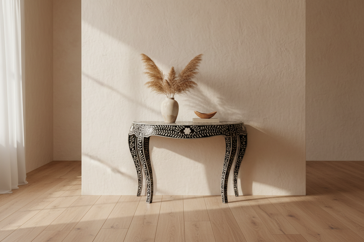Bone inlay floral pattern console table with curved legs, holding a vase of dried pampas grass.