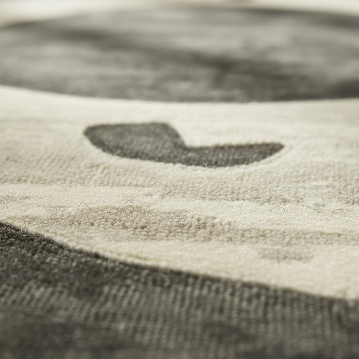 Close-up of a textured rug surface with a pattern