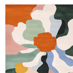 A vibrant, abstract area rug featuring a bold floral design with colorful shapes in shades of orange, green, pink, blue, and white. This contemporary wool rug is perfect for adding a splash of color to your living room. Ideal for those seeking a unique square area rug to enhance their home decor.