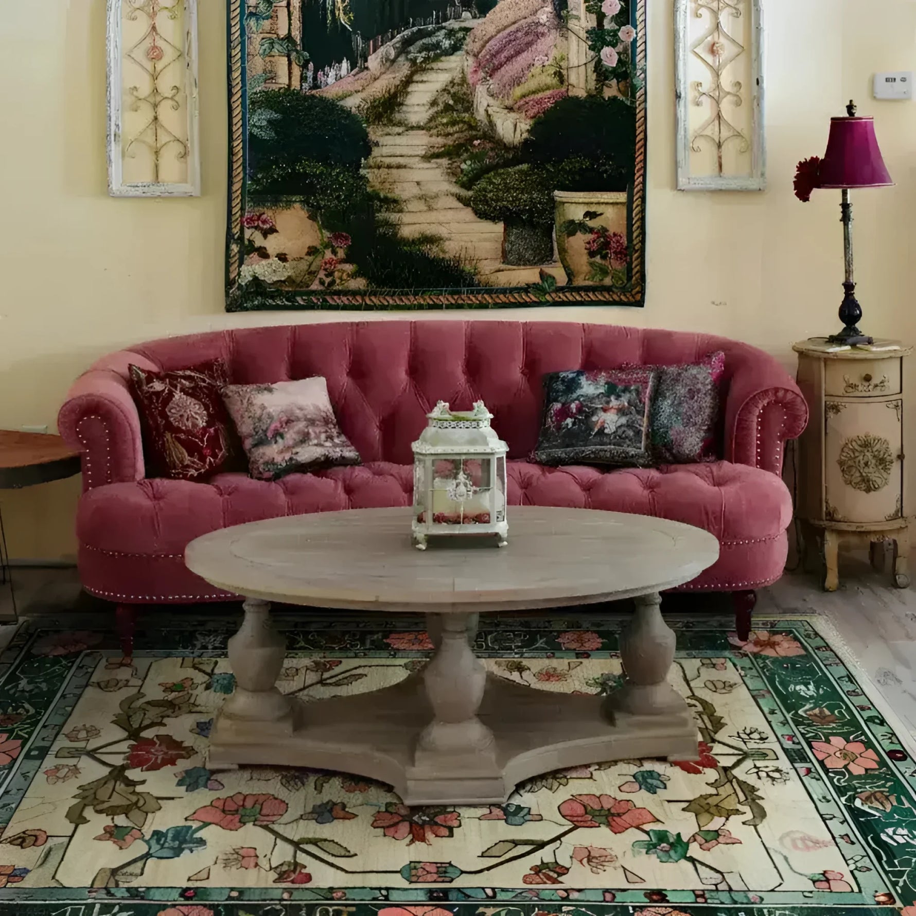 Elegant living room showcasing a Botanical Bliss Medium Hand Knotted Wool Rug, perfect for adding a touch of sophistication to any space. This large area rug features intricate floral patterns, ideal for those seeking Persian rug style in an 8x10 size. The wool rug beautifully complements the plush pink sofa and rustic wooden table, making it a stunning centerpiece for large living rooms.