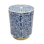 Botanical Blue Bone Inlay coffee table — cylindrical drum shape, navy ground with white leaf-vine inlay, gold base